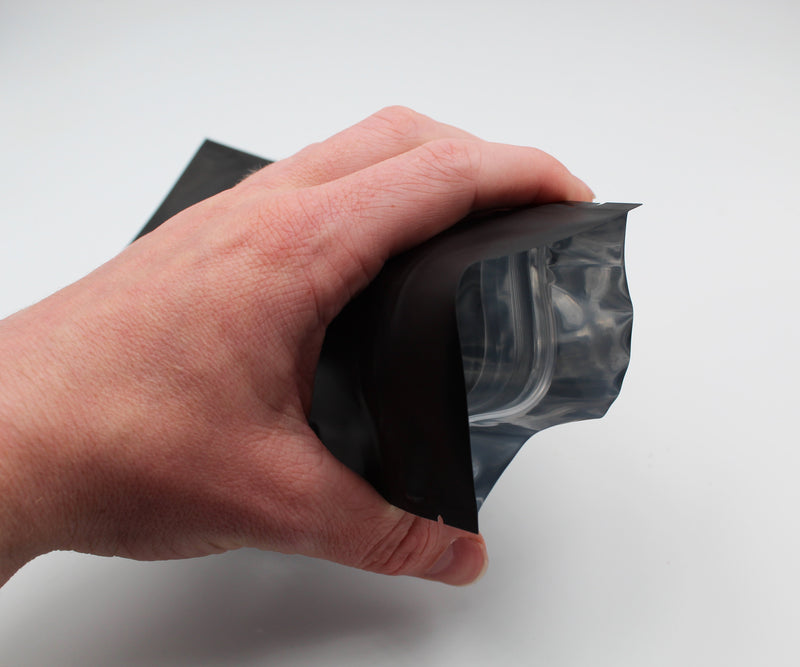 1/2oz (14g) Black Opaque Child-Resistant GriploK Mylar Dispensary Bag with Film Above Zipper (Opened)